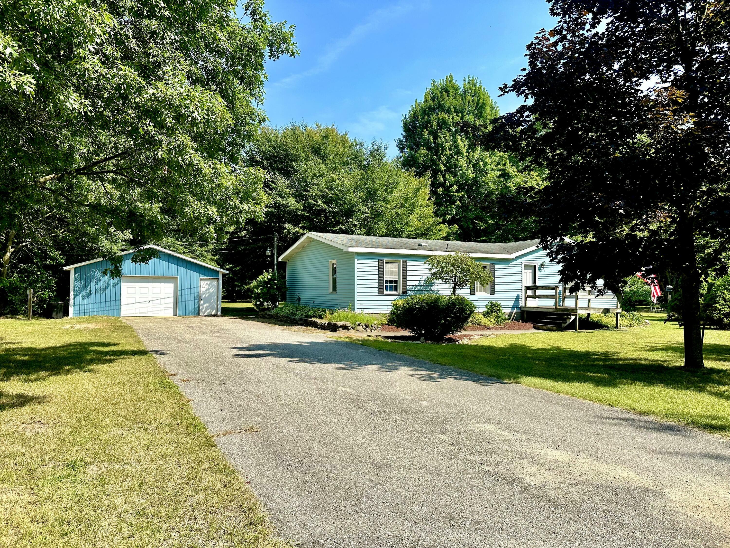 Property Photo:  2711 W Webster Road  MI 49437 