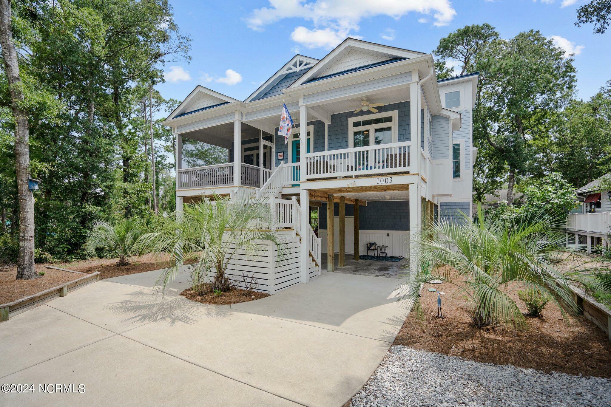 Property Photo:  1003 E Oak Island Drive  NC 28465 