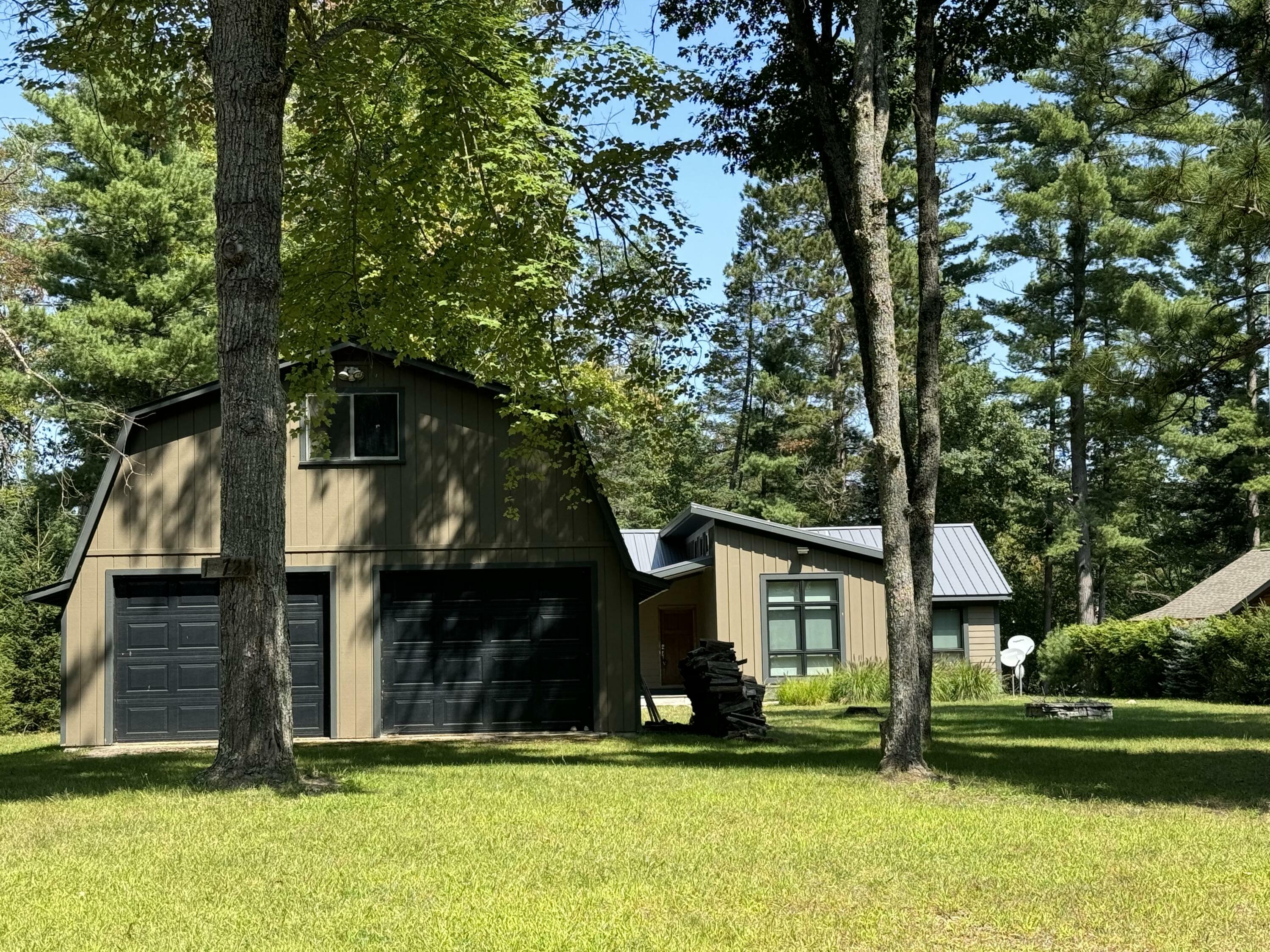 Property Photo:  10725 Arrow Drive  MI 49738 