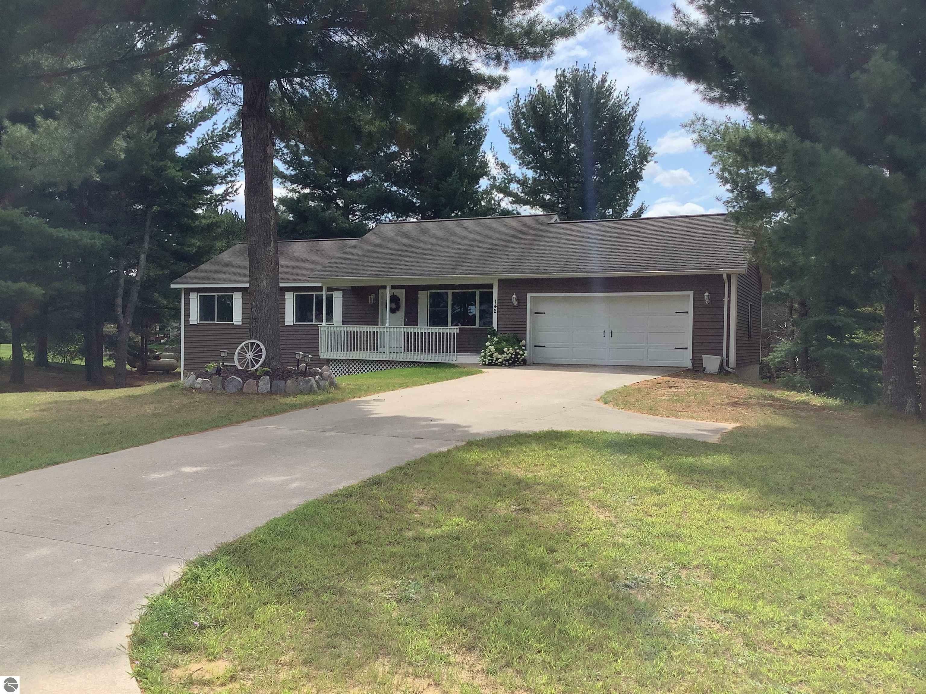 Property Photo:  142 Ringneck Lane  MI 49620 