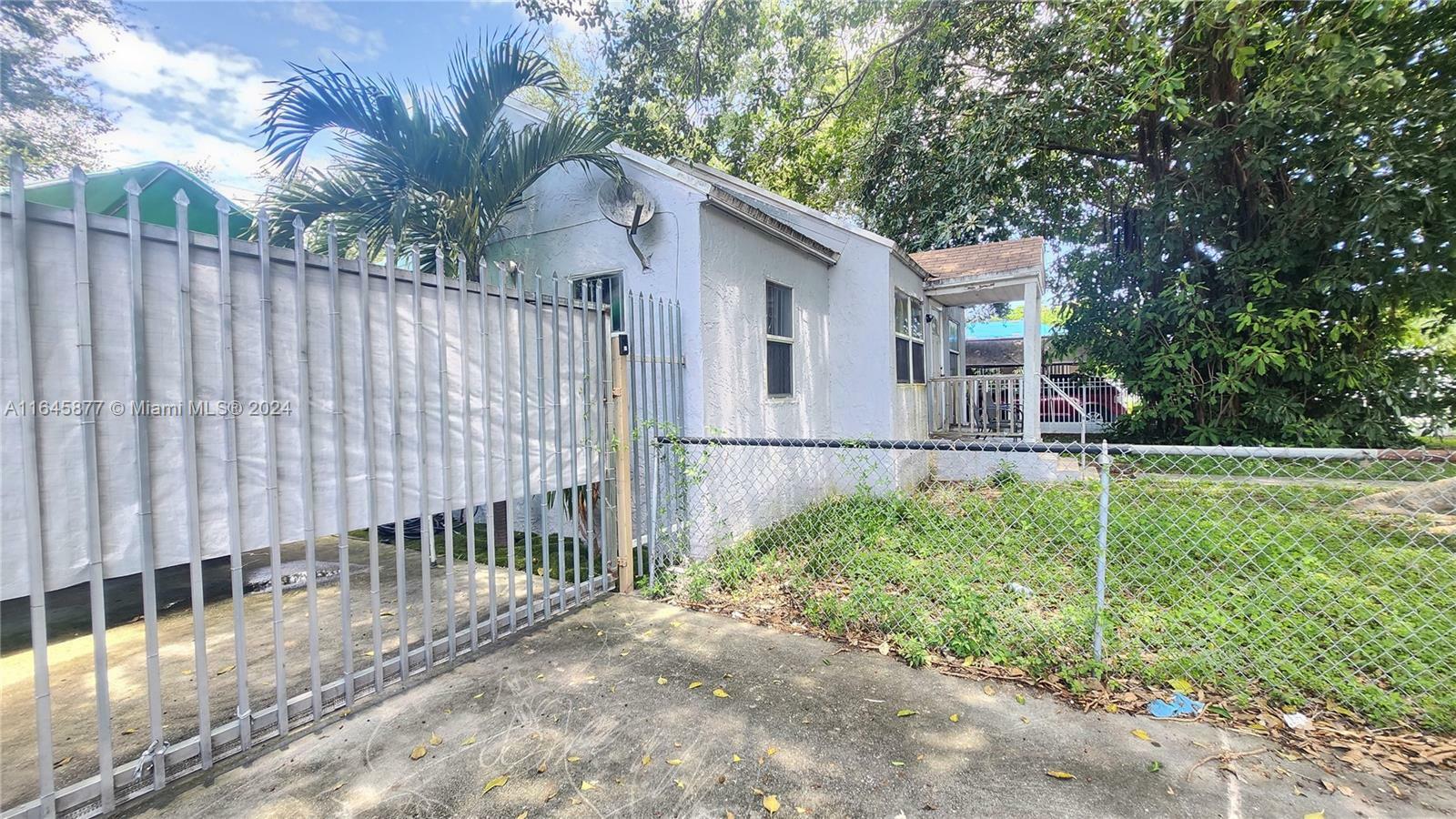 Property Photo:  1851 NW 90th St  FL 33147 