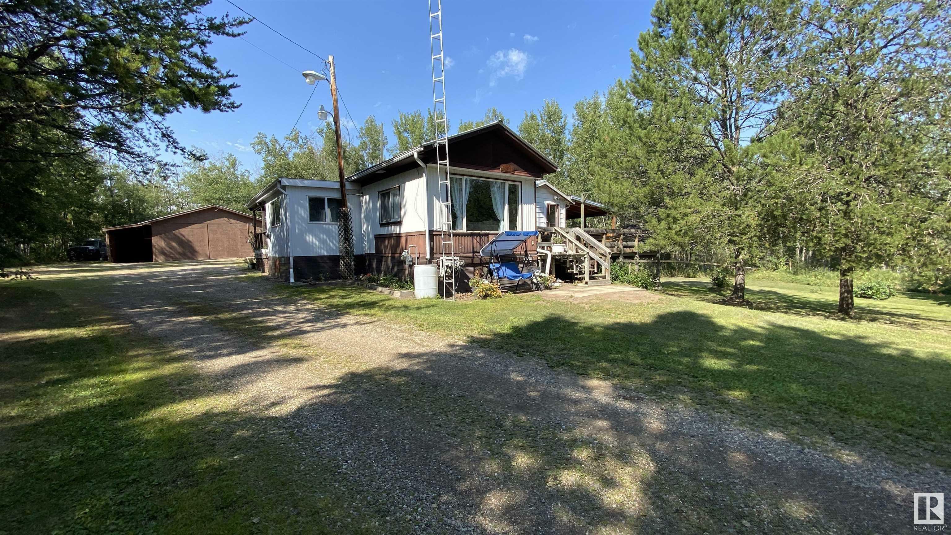 Property Photo:  11124 Twp Rd 595 106  AB T0A 0C0 