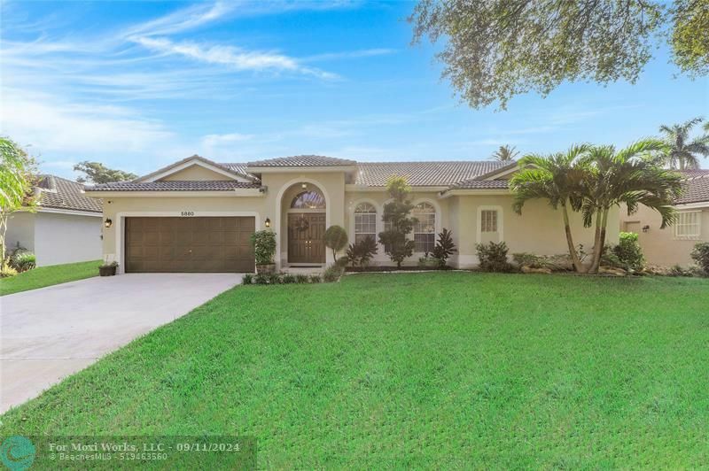 Property Photo:  5880 NW 40th Ln  FL 33073 