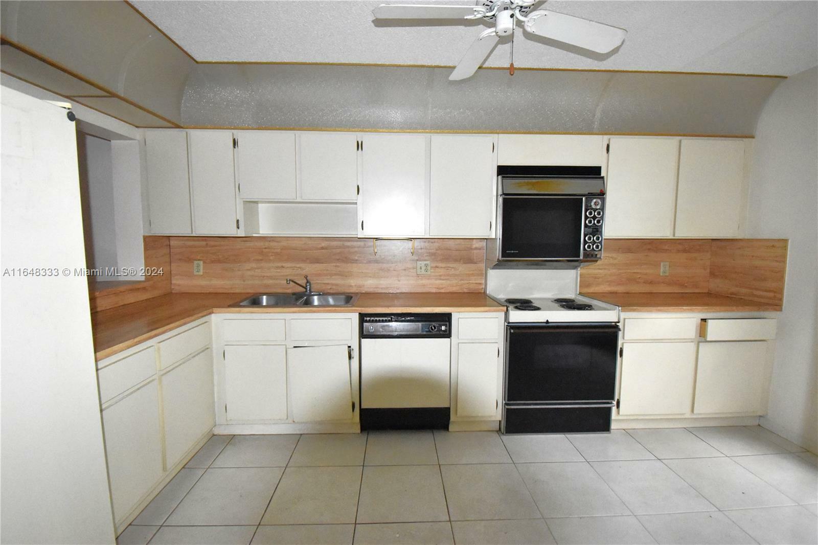 Property Photo:  9704 NW 15th St 313  FL 33024 