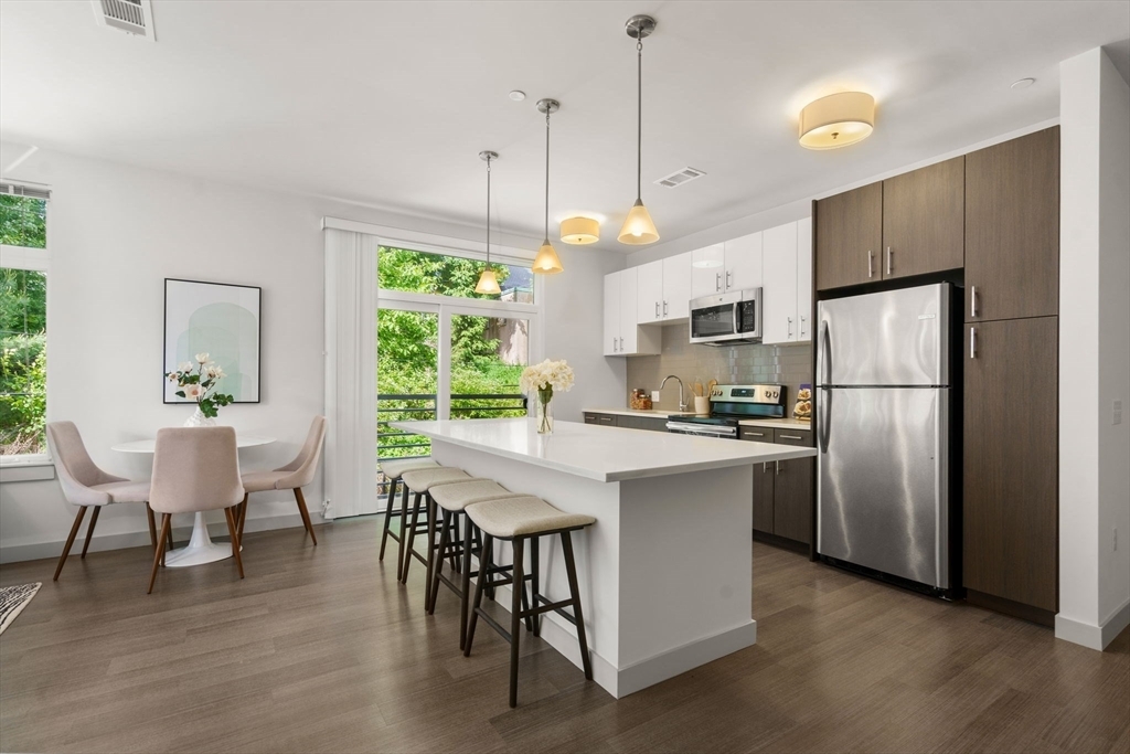 Property Photo:  99 Tremont At Oak Square 415  MA 02135 