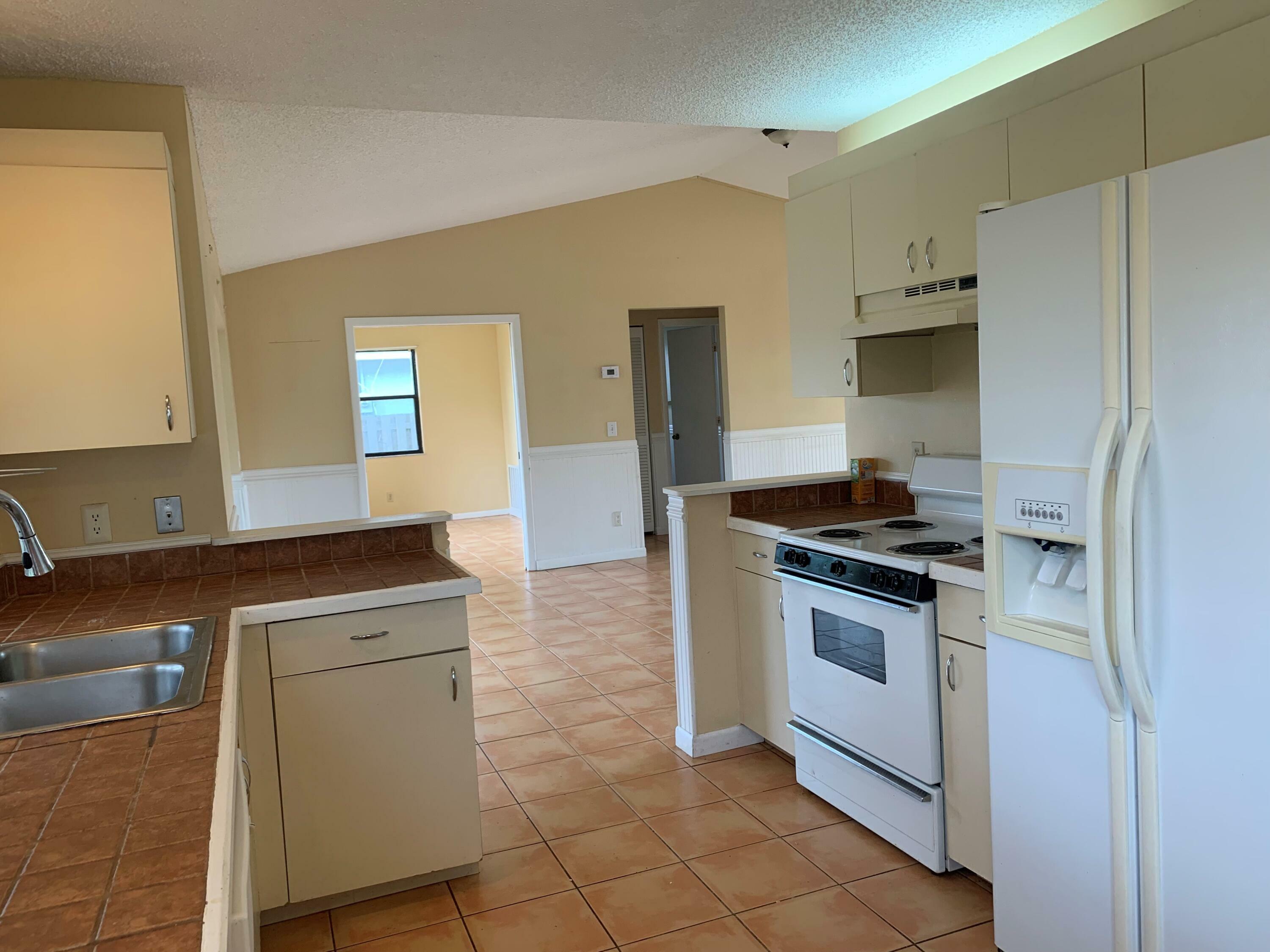 Property Photo:  458 SE Cork Road  FL 34984 