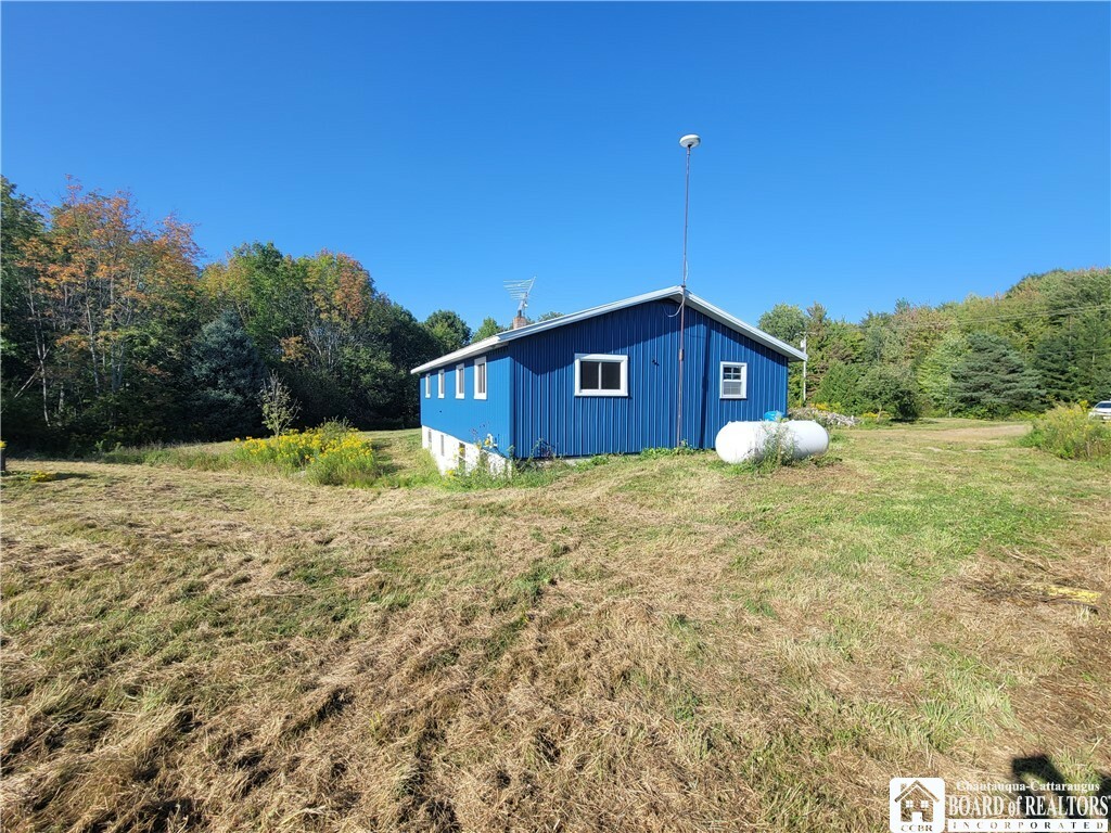 Property Photo:  2521 Fisher Hill Road  NY 14747 