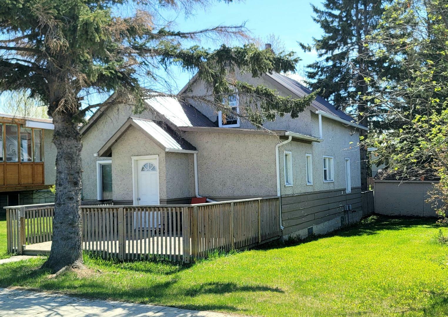 Property Photo:  10319 Churchill Drive  AB T0A 2C0 