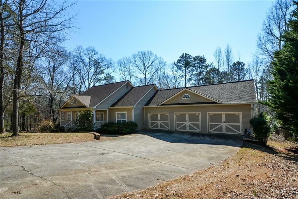 Property Photo:  6865 Cowan Mill Road  GA 30187 