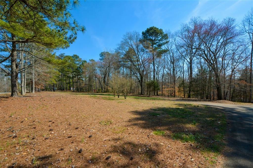 Property Photo:  6865 Cowan Mill Road  GA 30187 