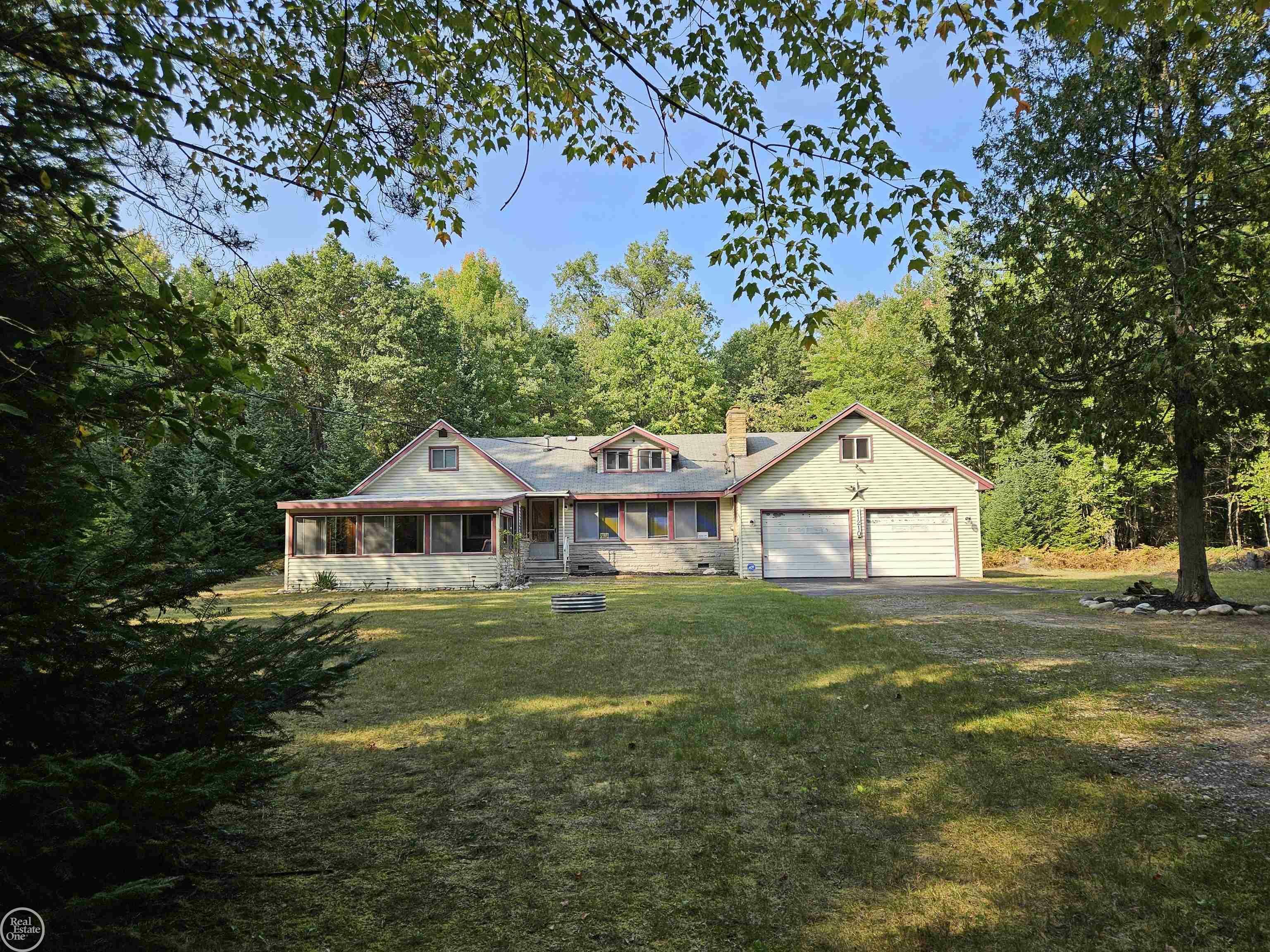 Property Photo:  11210 Tranquil Trail  MI 48653 