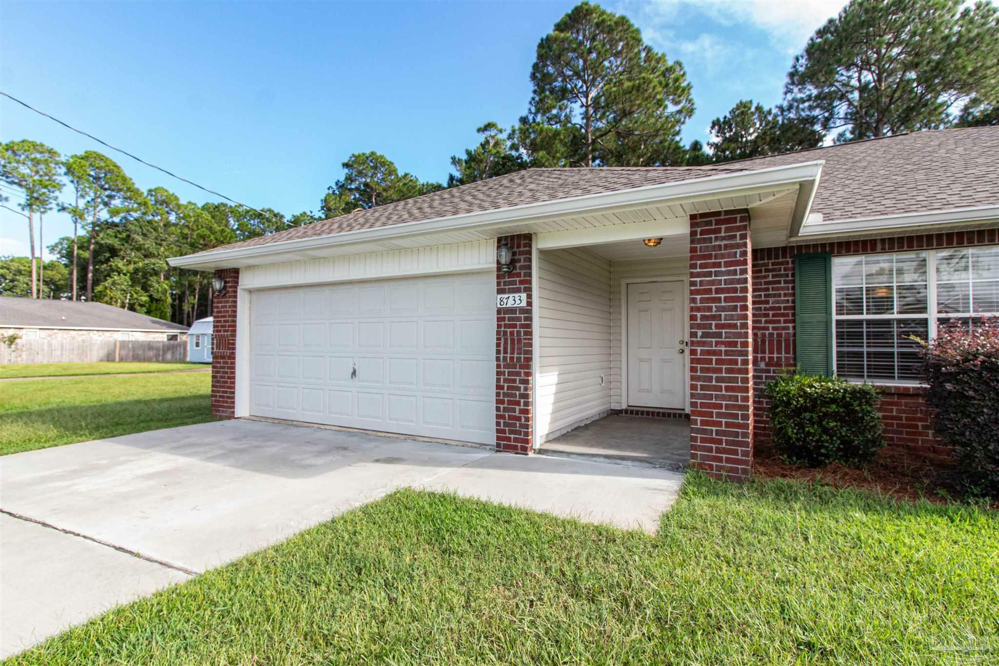 Property Photo:  8733 El Paseo St  FL 32566 