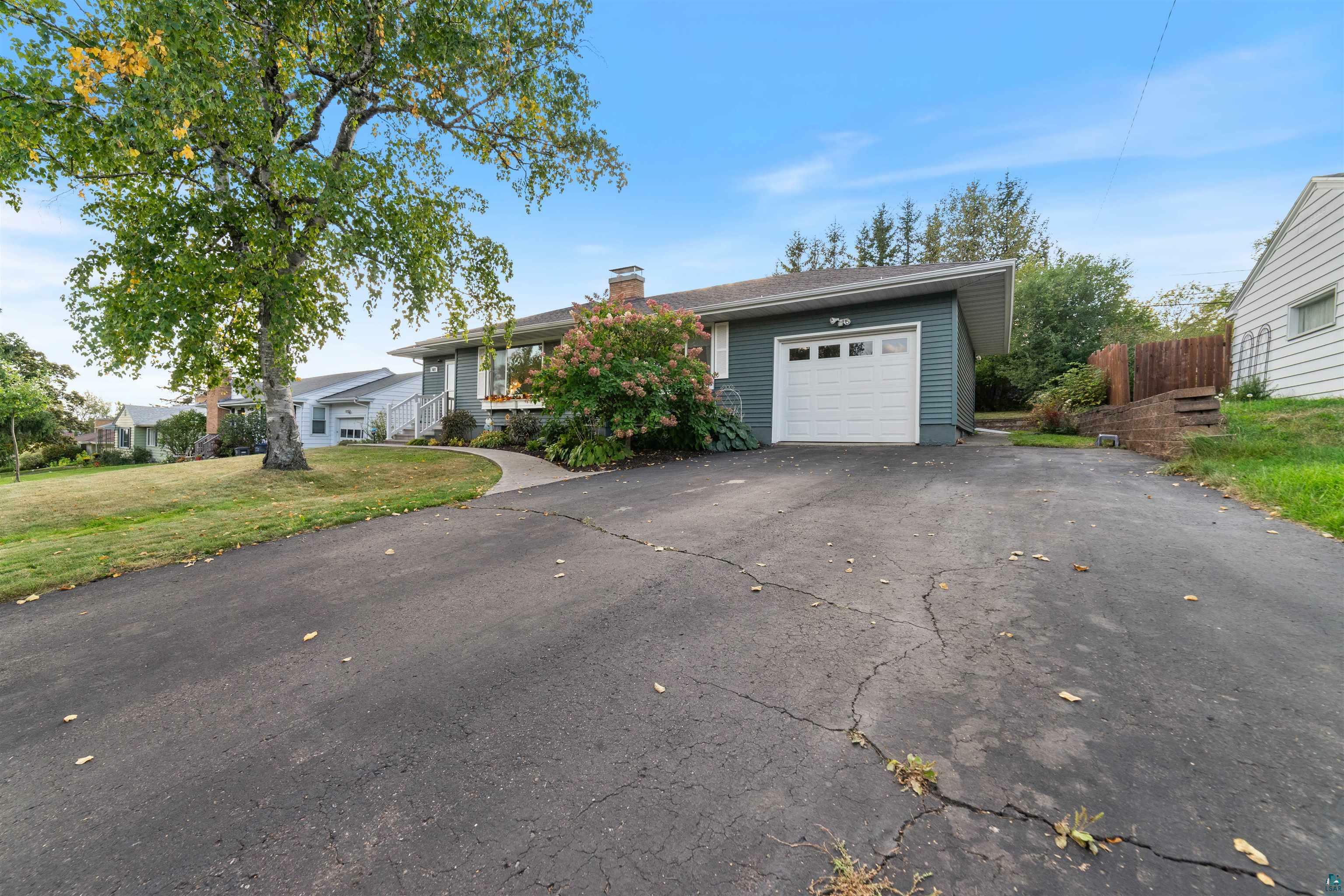 Property Photo:  827 N 40th Ave E  MN 55804 