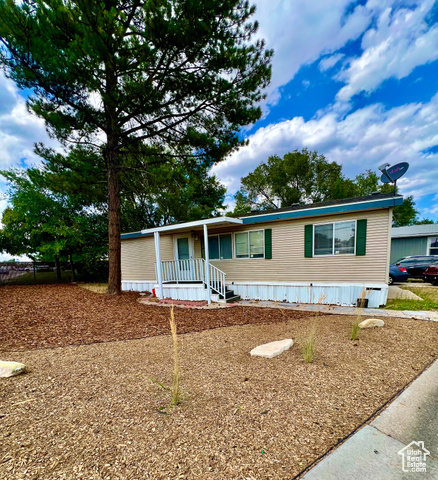 Property Photo:  3490 S Westcrest Rd W 1  UT 84120 