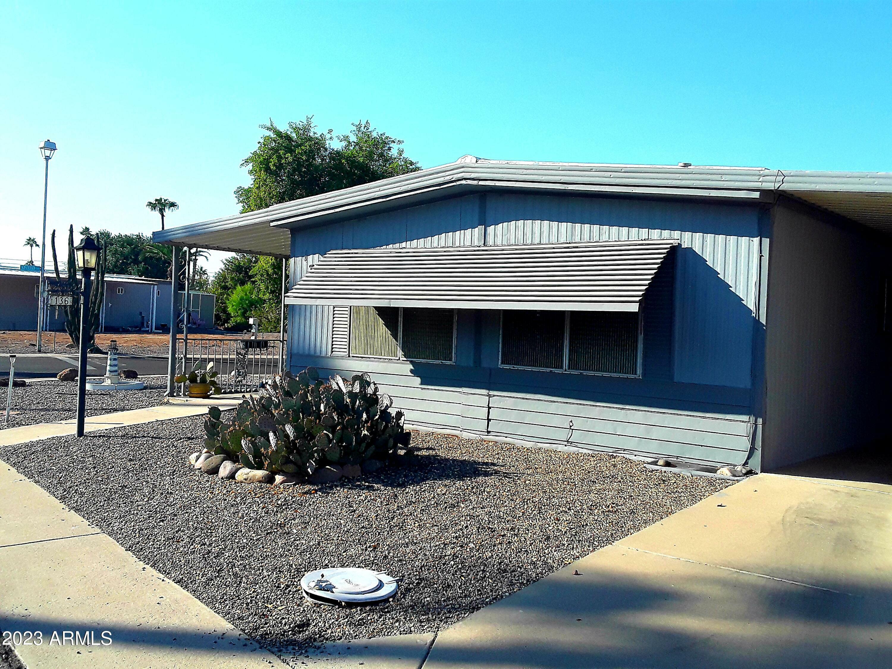 Property Photo:  10701 N 99th Avenue 136  AZ 85345 