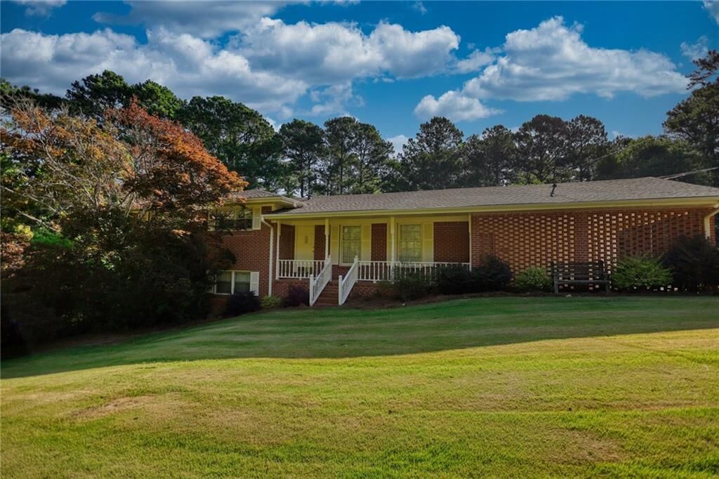 Property Photo:  7101 Hilltop Drive  GA 30014 