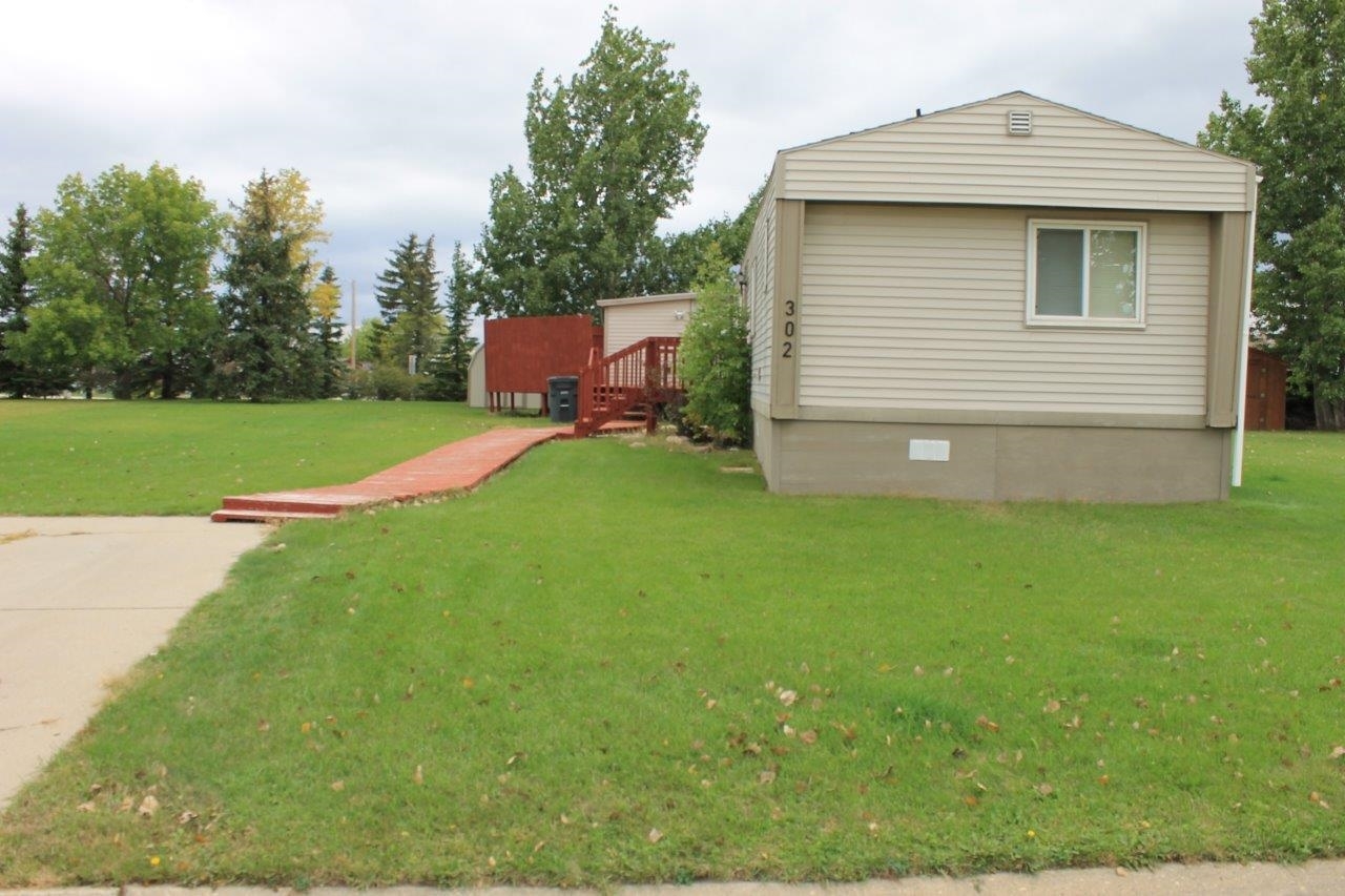 Property Photo:  406 31st Ave Lot #302 SE #302  ND 58701 