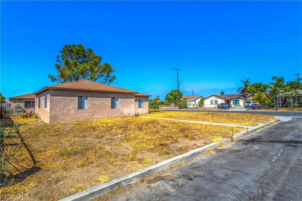 Property Photo:  15490 Pine Avenue  CA 92335 