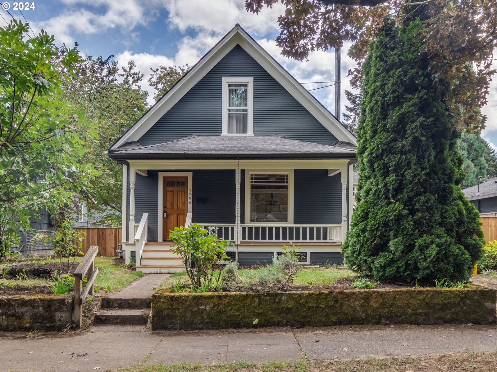 Property Photo:  1056 NE Madrona St  OR 97211 