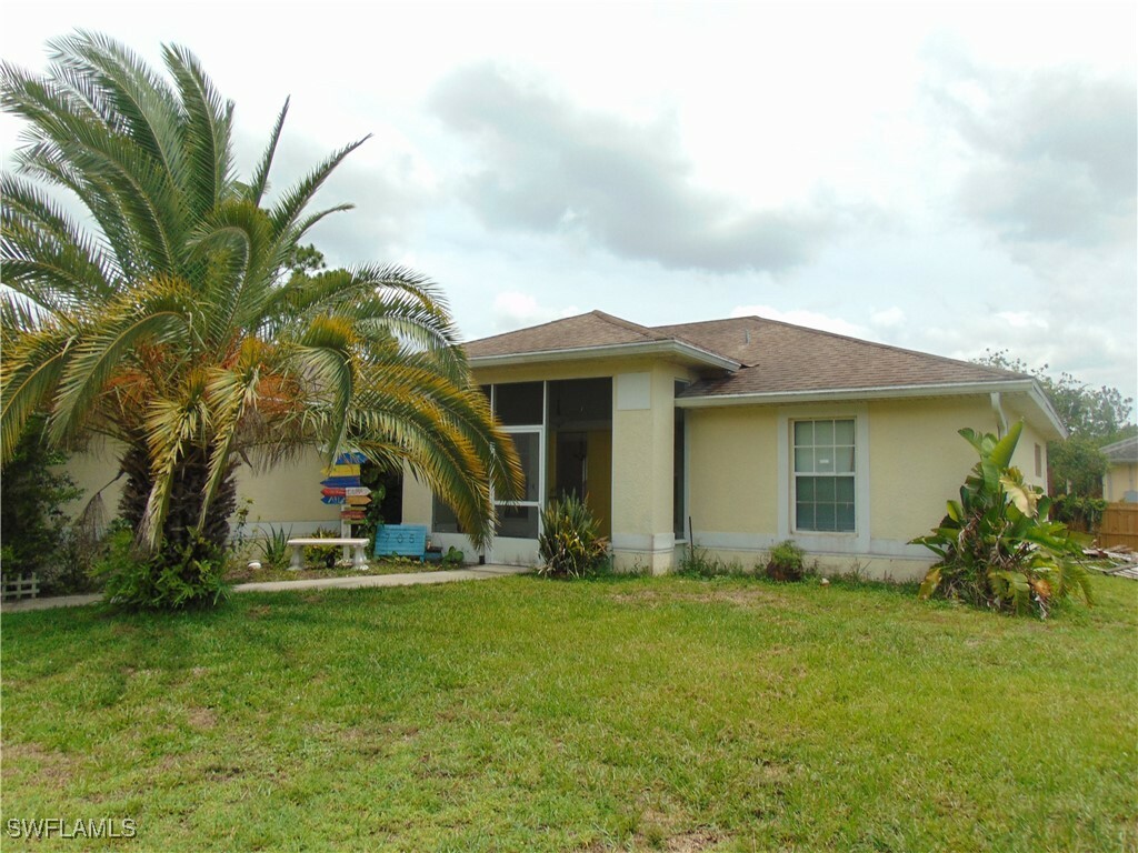 Property Photo:  705 W 6th Street  FL 33972 