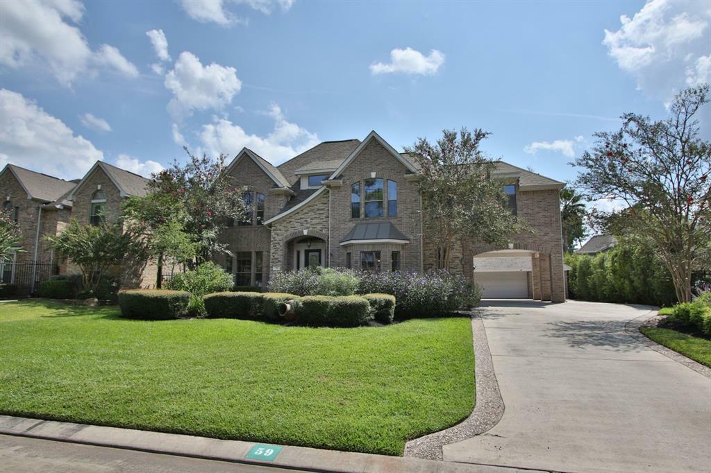 Property Photo:  59 N Veilwood Circle  TX 77382 