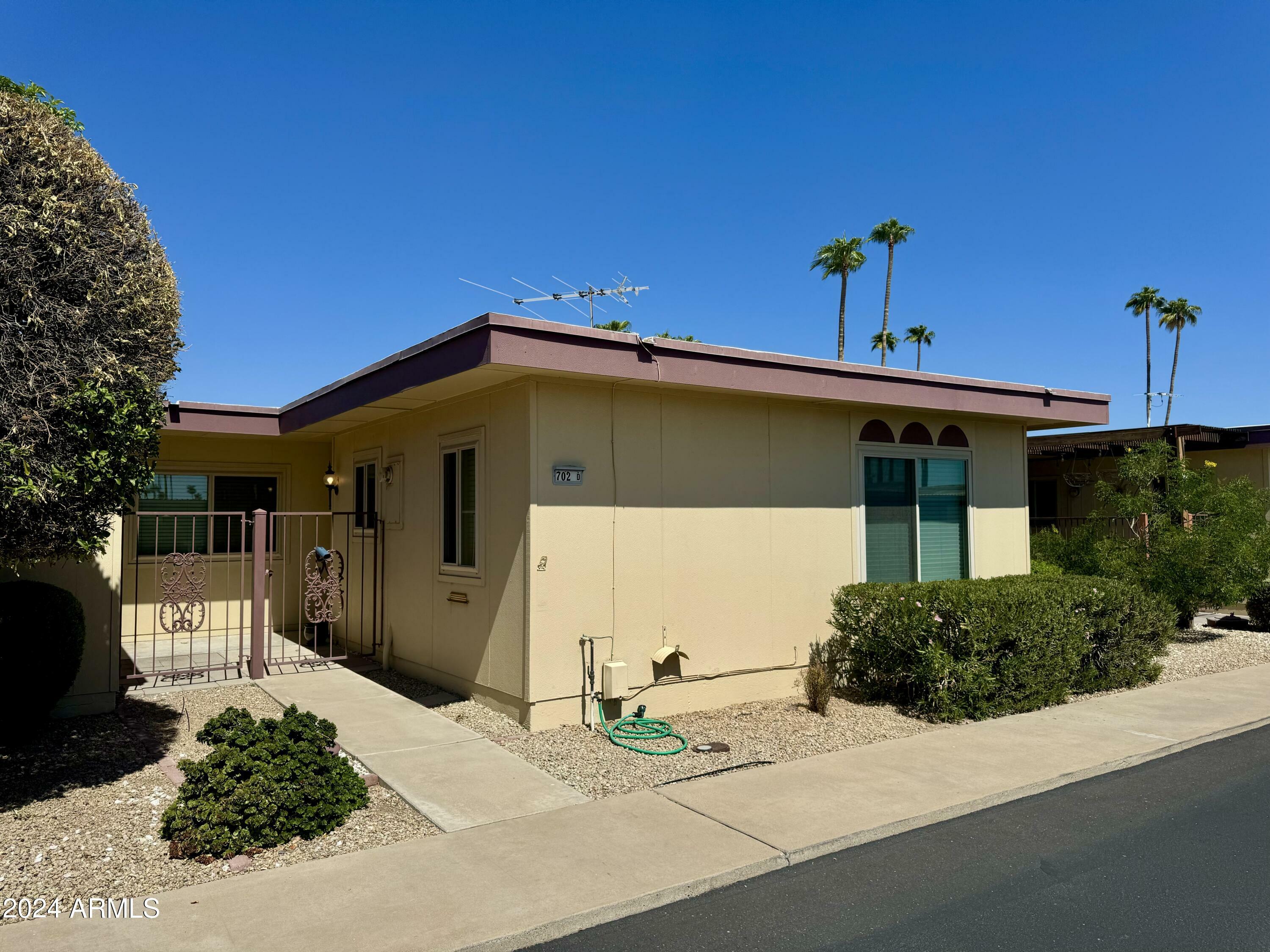 Property Photo:  13702 N 98th Avenue D  AZ 85351 