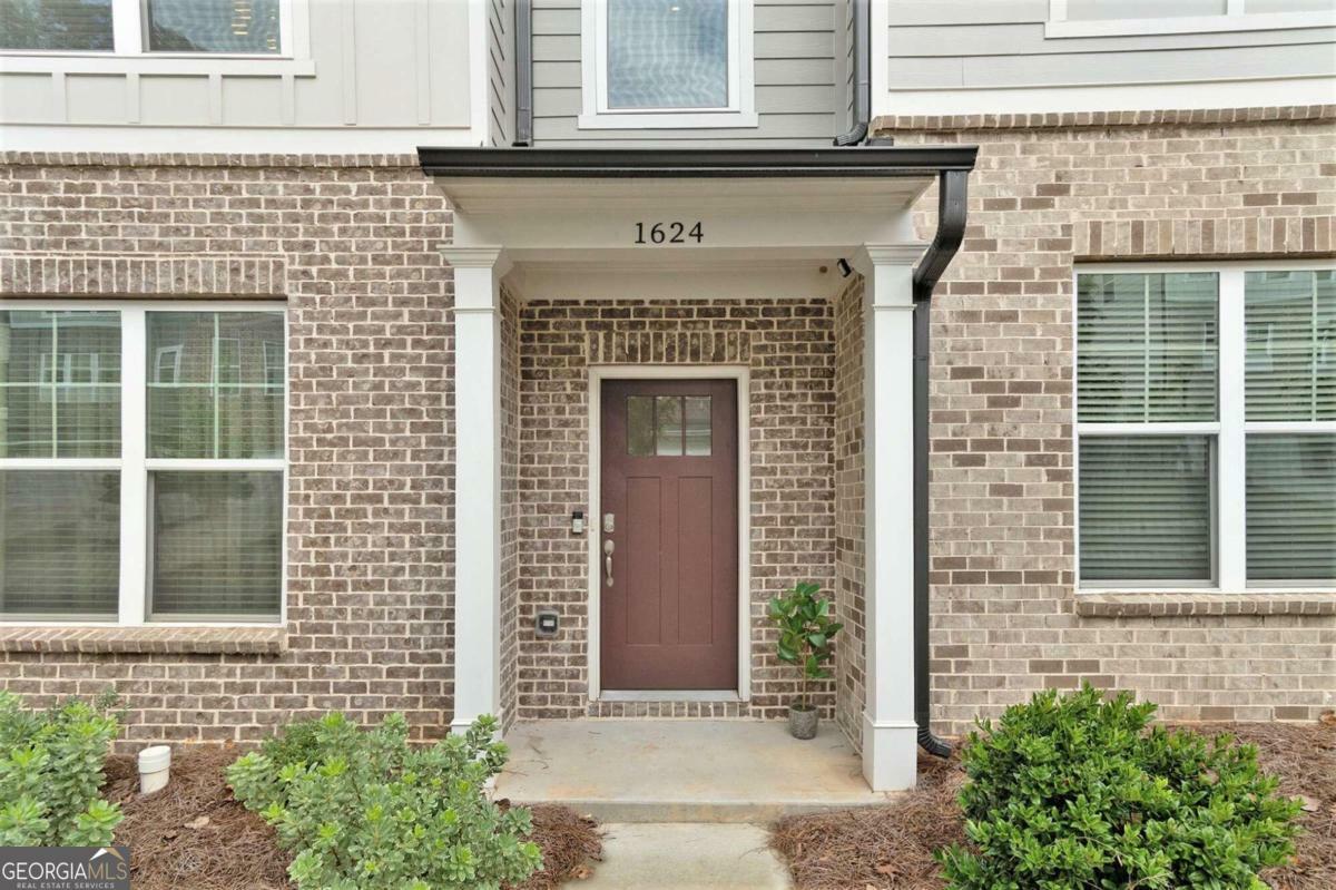 Property Photo:  1624 Venture Point Way  GA 30032 