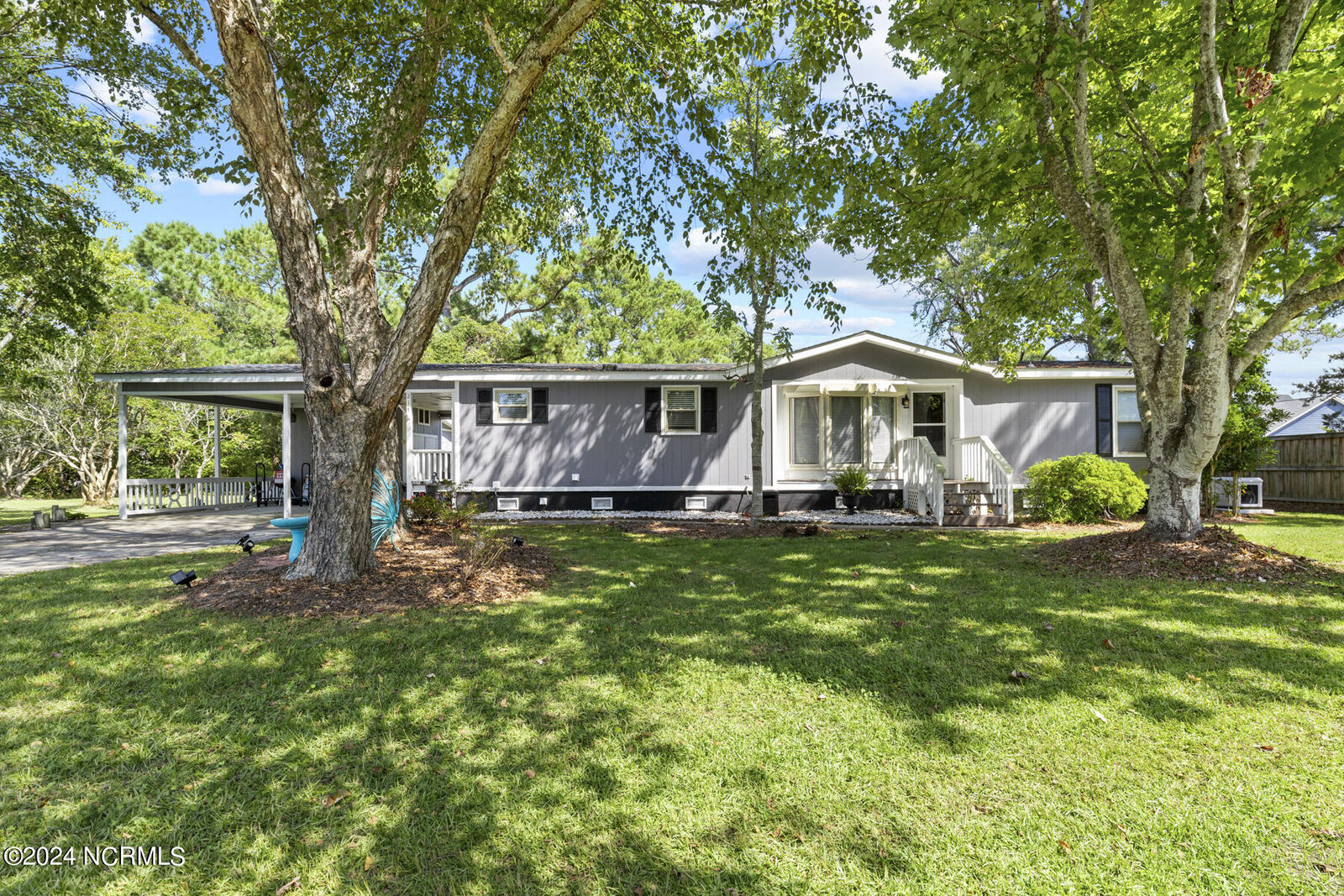 Property Photo:  214 Champion Drive  NC 28443 