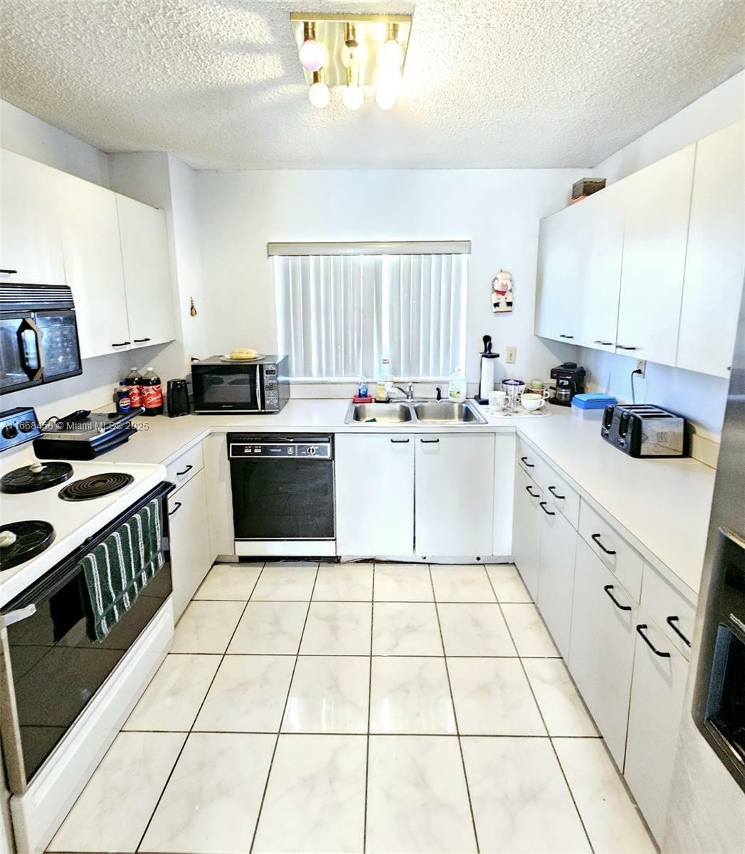 Property Photo: 12662 NW 8th Trl FL 33182