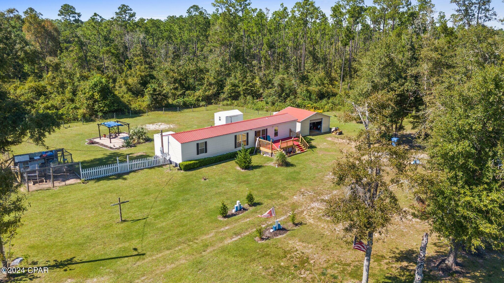 Property Photo:  17233 Highway 231  FL 32438 