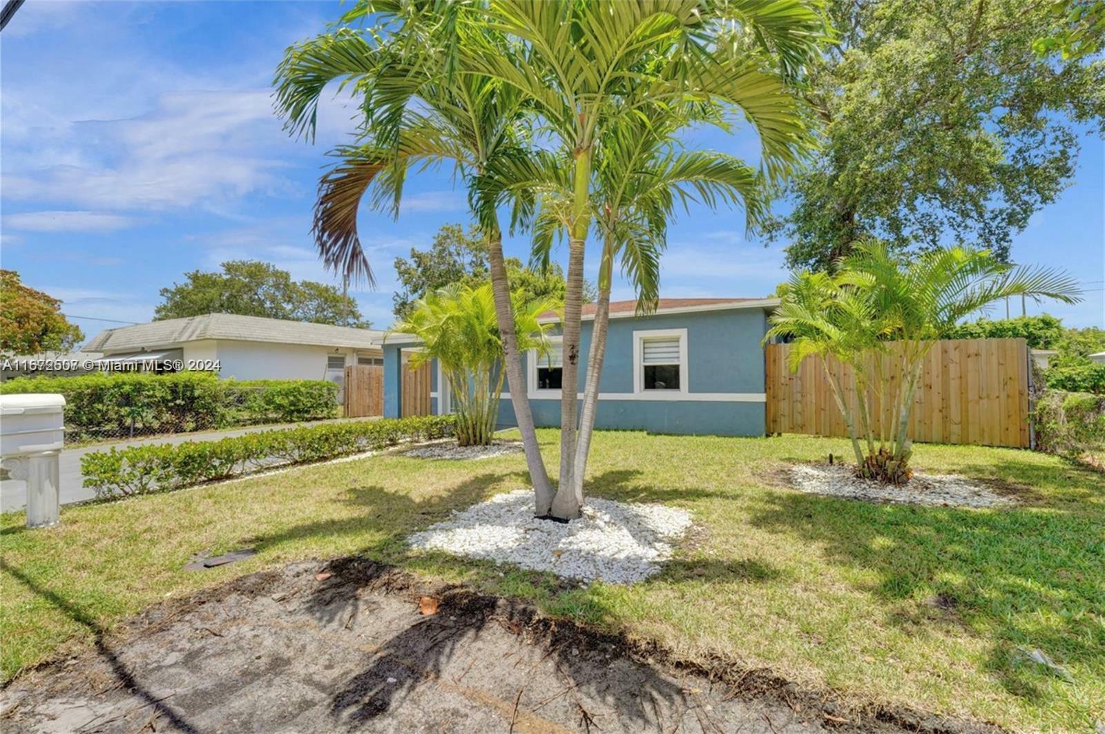 Property Photo:  878 NW 17th Ave (Front)  FL 33311 