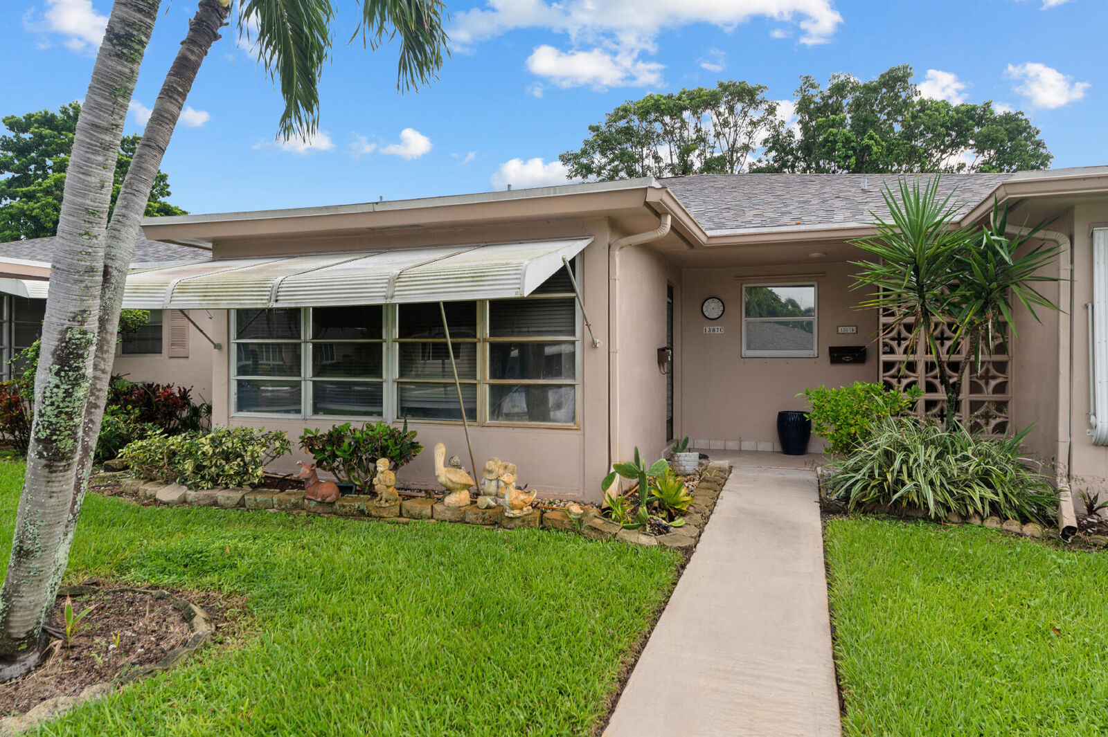 Property Photo:  1387 High Point Way NW C  FL 33445 