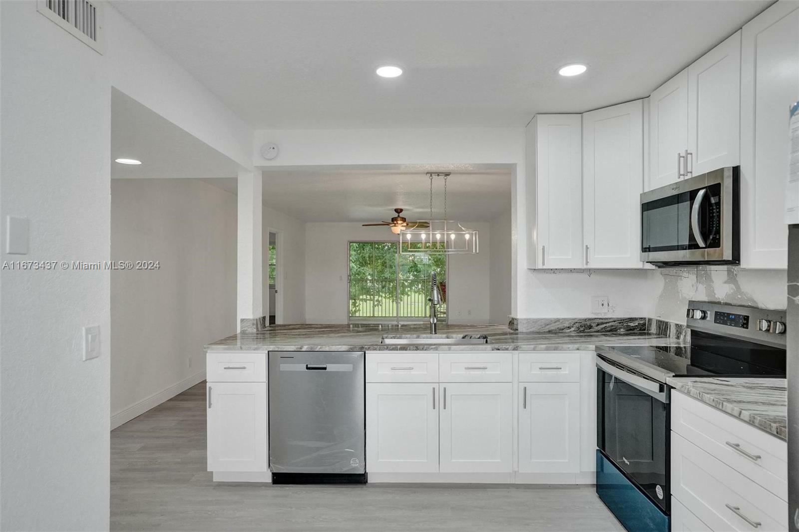 Property Photo:  12650 SW 6th St 407K  FL 33027 