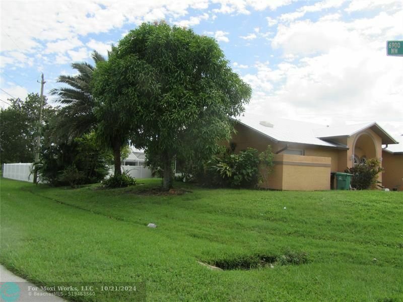 Property Photo:  6958 NW Hartney Way  FL 34983 