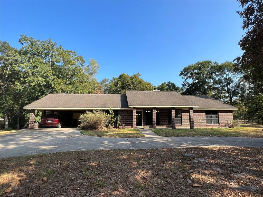 Property Photo:  12345 Oak Leaf Road  TX 77303 