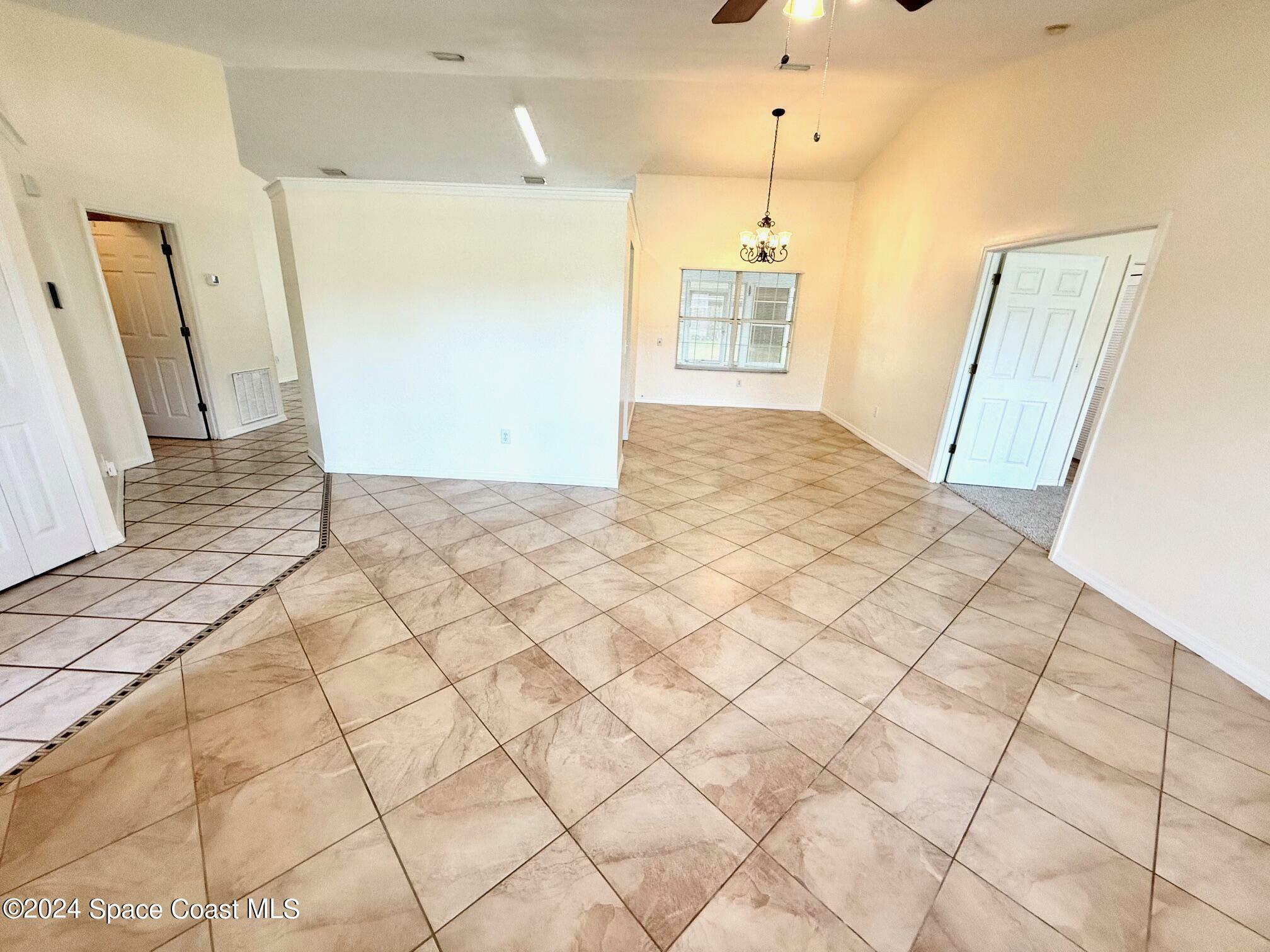 Property Photo:  7070 Ackerman Avenue  FL 32927 