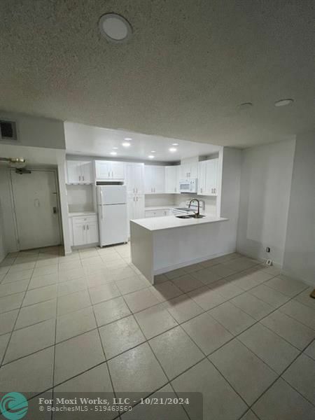 Property Photo:  10777 W Sample Rd 103  FL 33065 