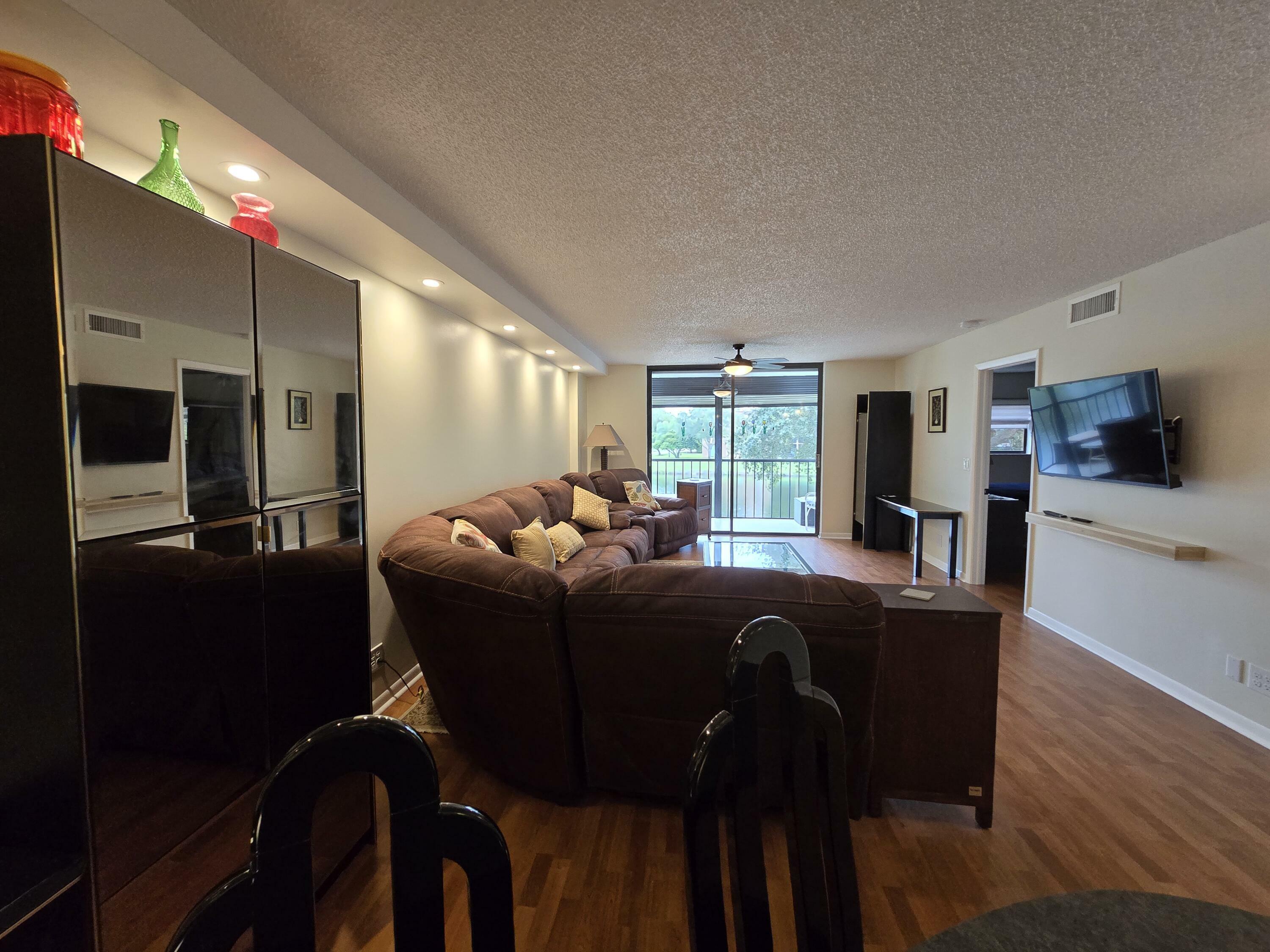 Property Photo:  5550 Witney Drive 203  FL 33484 