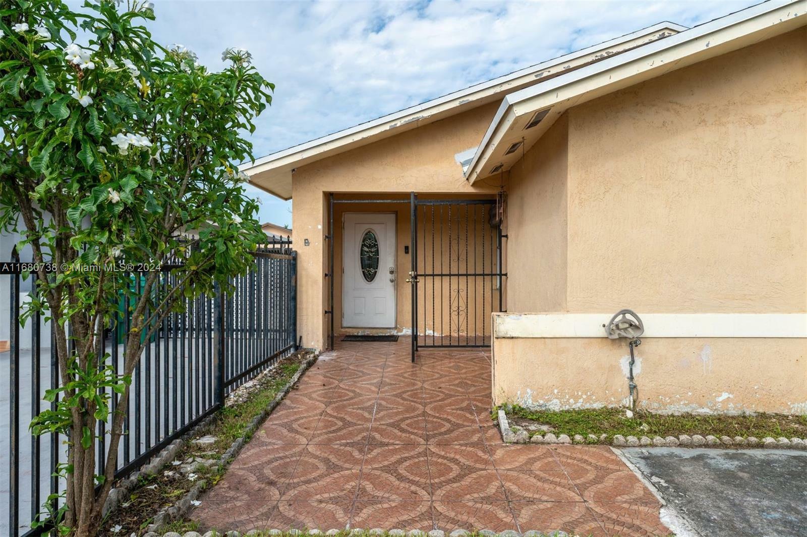 Property Photo:  20848 SW 118th Ave  FL 33177 