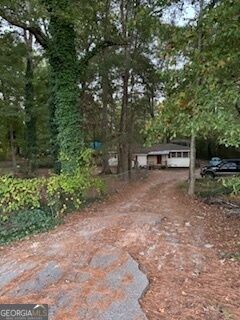 Property Photo:  647 Oglesby Bridge Road SE  GA 30094 