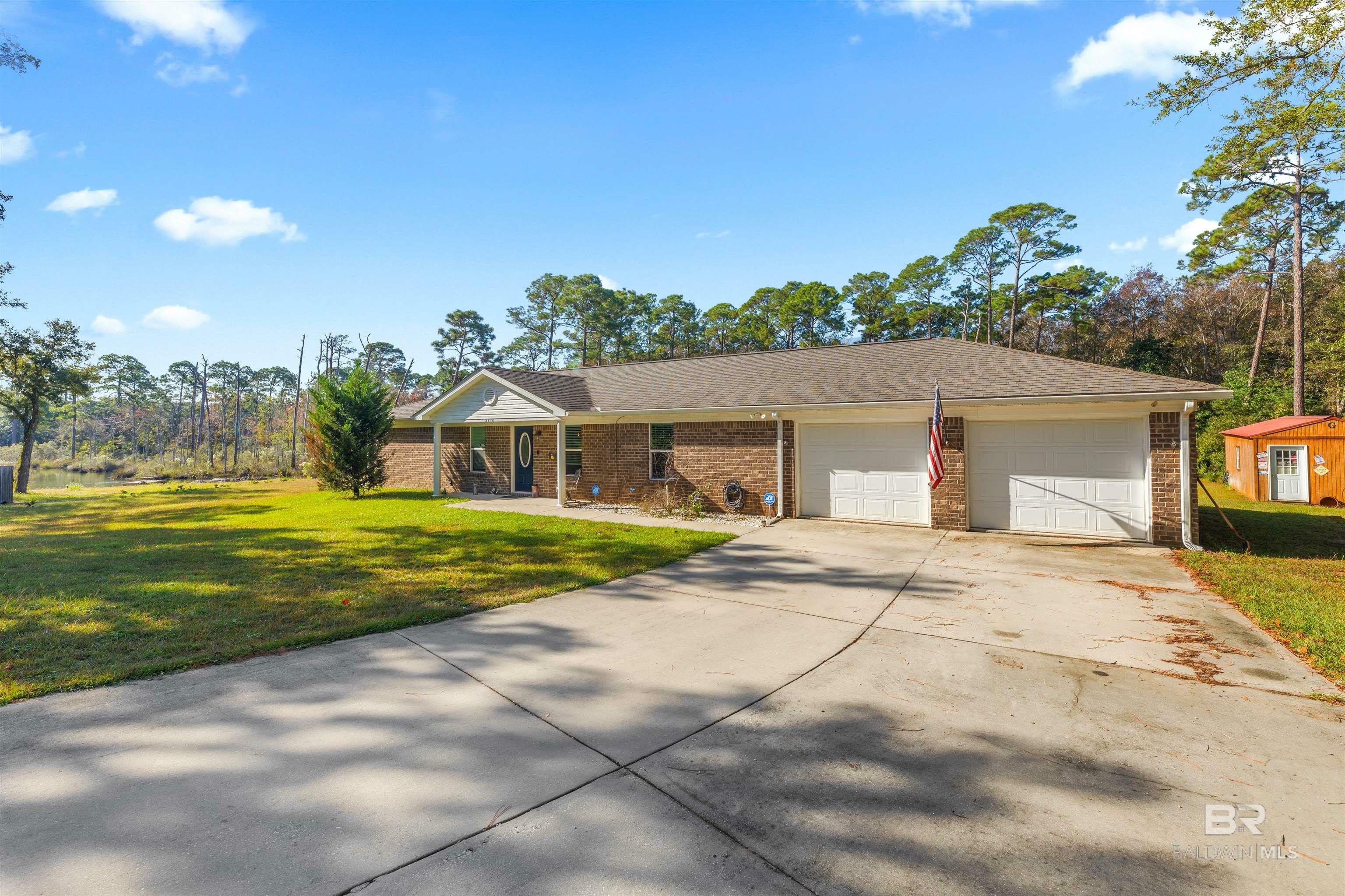 Property Photo:  9778 N Bayou Road  AL 36549 