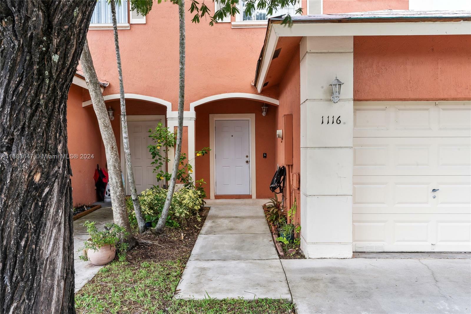 Property Photo:  1116 NW 100th Ave 1116  FL 33024 