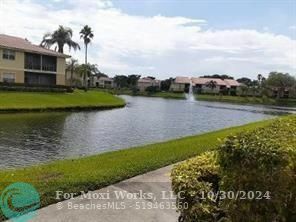 Property Photo:  1227 SW 46th Ave 303  FL 33069 