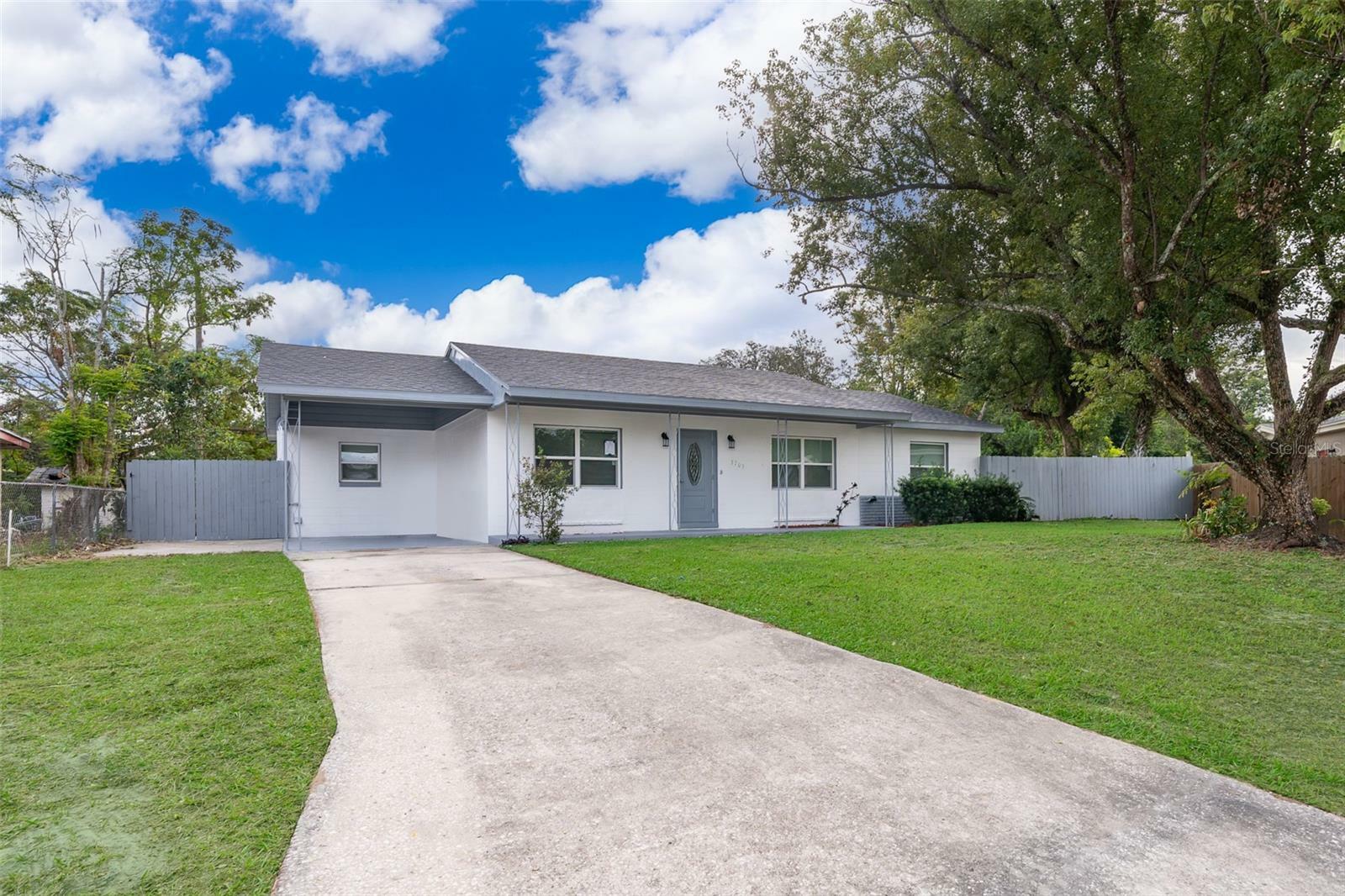 Property Photo:  3703 Wade Road  FL 32808 