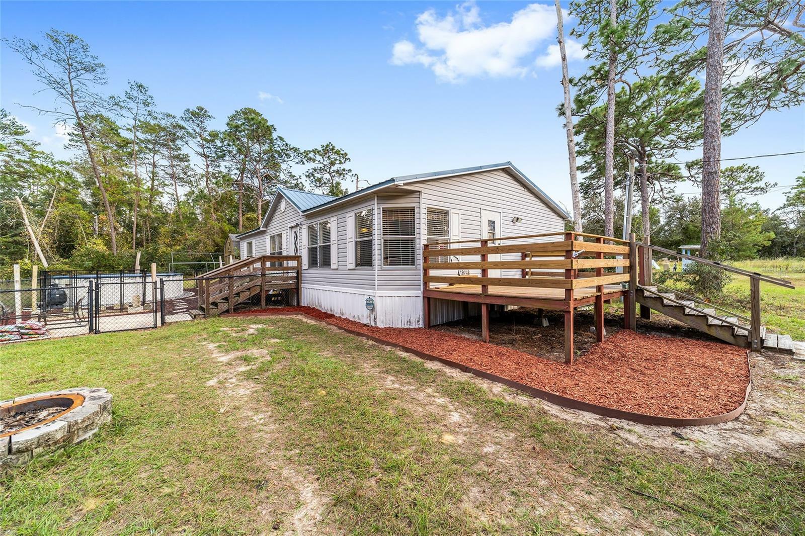 Property Photo:  19702 SE 91st Street  FL 32179 