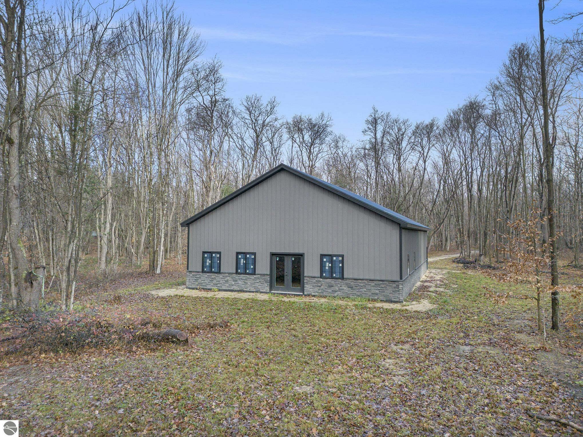 Property Photo:  7068 NE Covert Road  MI 49659 