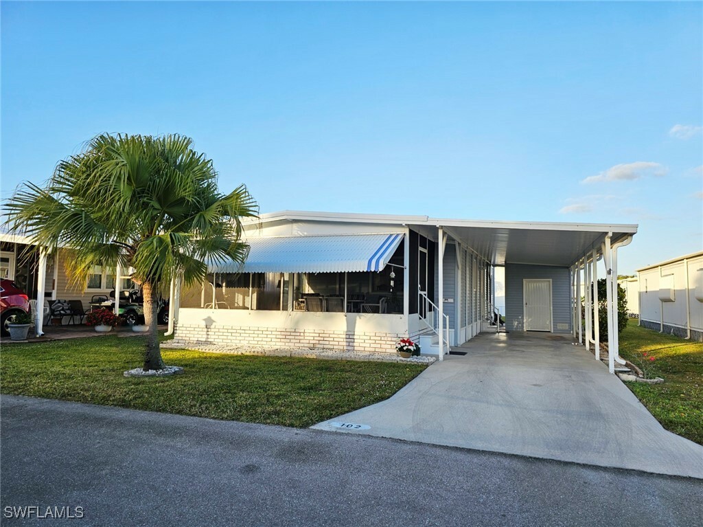 Property Photo:  102 Poinsettia Drive  FL 33905 