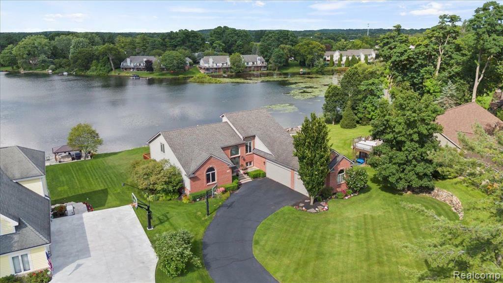 Property Photo:  9042 Softwater Woods Drive  MI 48348 4262 