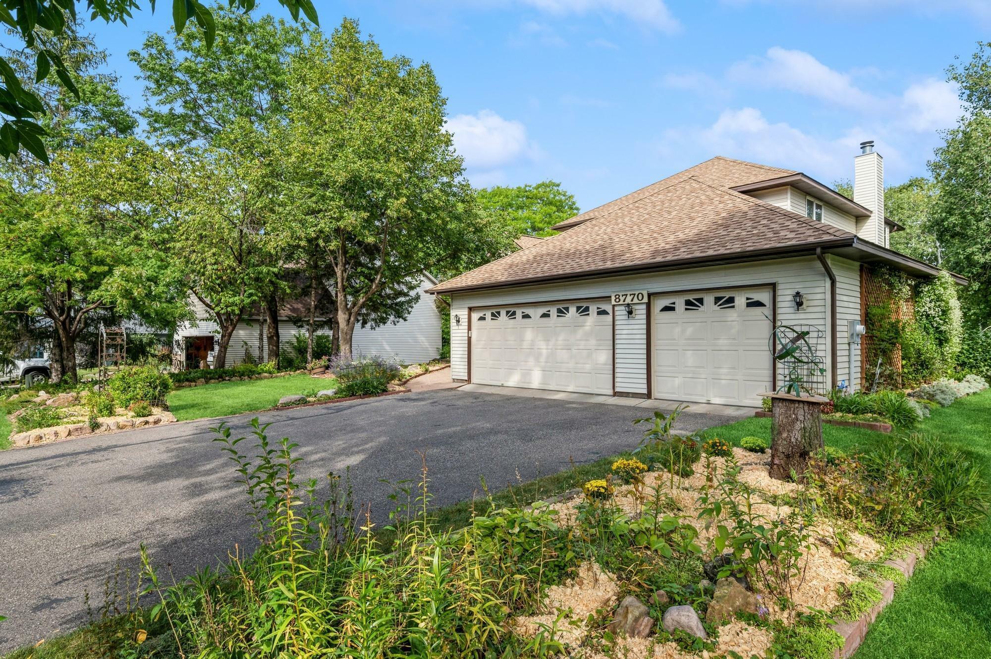 Property Photo:  8770 Norwood Lane N  MN 55369 