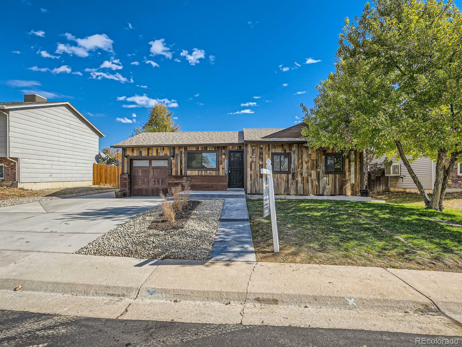 Property Photo: 1876 S Nucla Street CO 80017